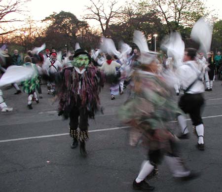 A Green Man disrupting the Morris dancing