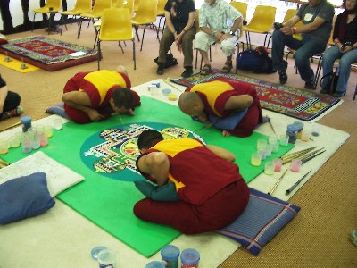 Monks at work on mandala at National Folk Festival Canberra